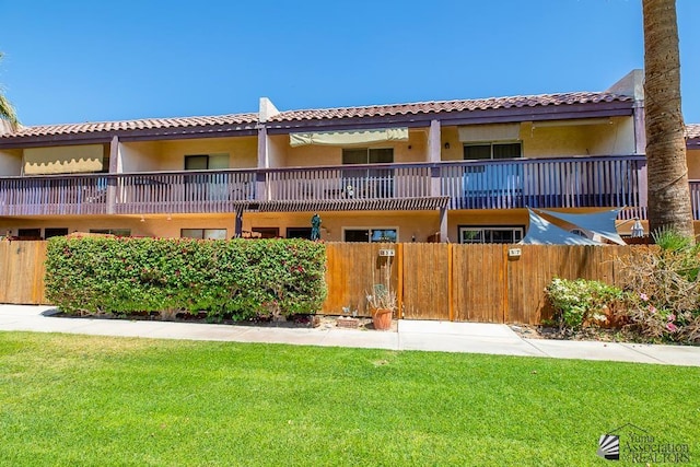 2901 S Palo Verde Ln # 38, Yuma, AZ 85364 - view of property with stucco siding, a balcony, and a tile roof