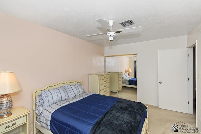 2901 S Palo Verde Ln # 38, Yuma, AZ 85364 - bedroom with light colored carpet, a ceiling fan, and a closet
