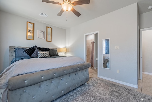 bedroom with visible vents, a ceiling fan, baseboards, and light tile patterned flooring