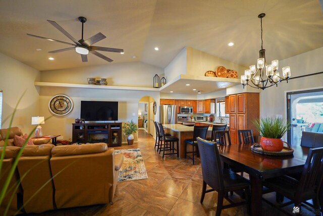 kitchen with light stone counters, sink, tasteful backsplash, and appliances with stainless steel finishes