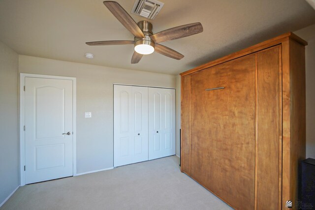 washroom with cabinets and washing machine and clothes dryer