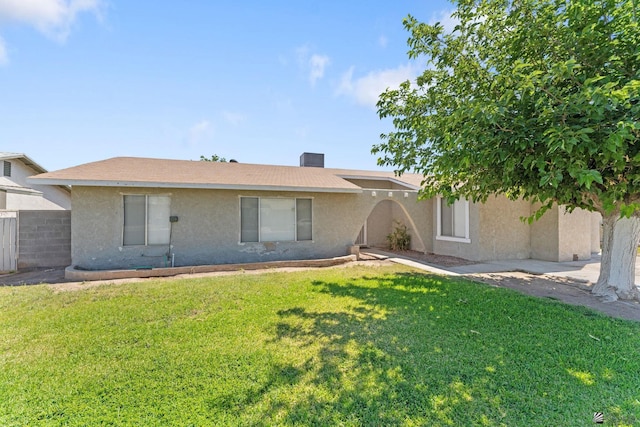 2213 W Pueblo St, Yuma, AZ 85364 - view of front of house with stucco siding and a chimney