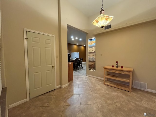 interior space featuring a high ceiling