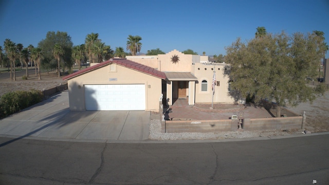 view of front of property with a garage