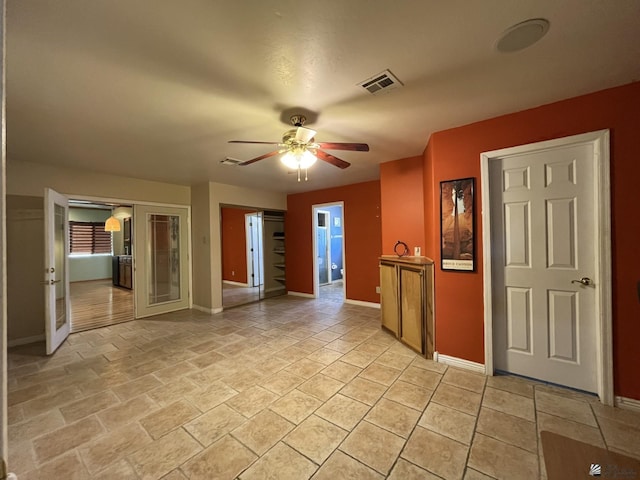 spare room featuring ceiling fan