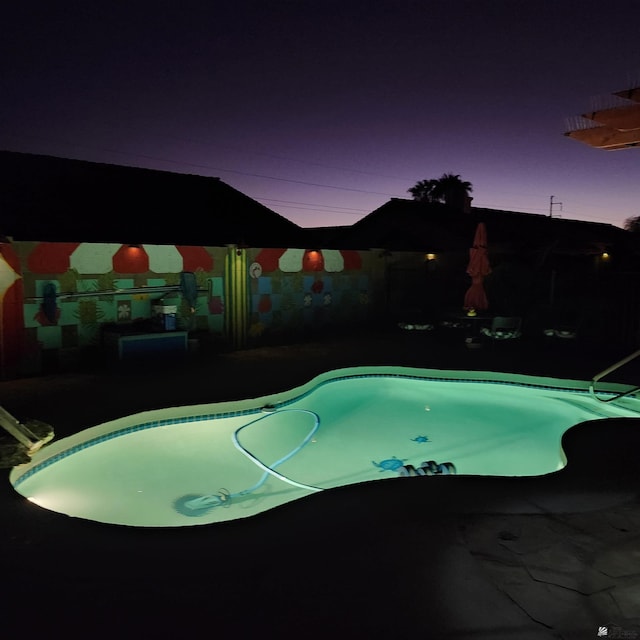 view of pool with a fenced in pool and a patio area