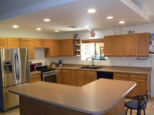 kitchen featuring open shelves, a breakfast bar area, recessed lighting, a sink, and appliances with stainless steel finishes