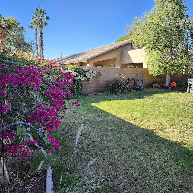 view of yard featuring fence
