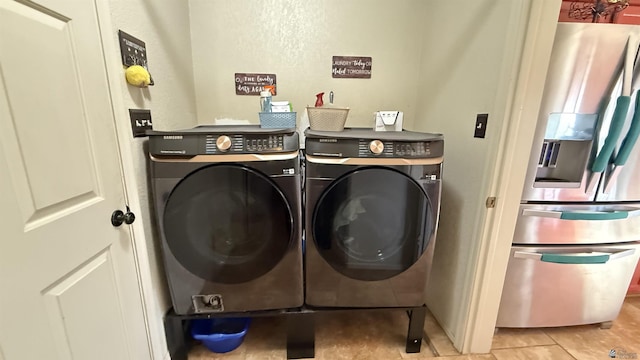 6311 E 42nd St, Yuma, AZ 85365 - laundry area featuring separate washer and dryer and light tile patterned floors