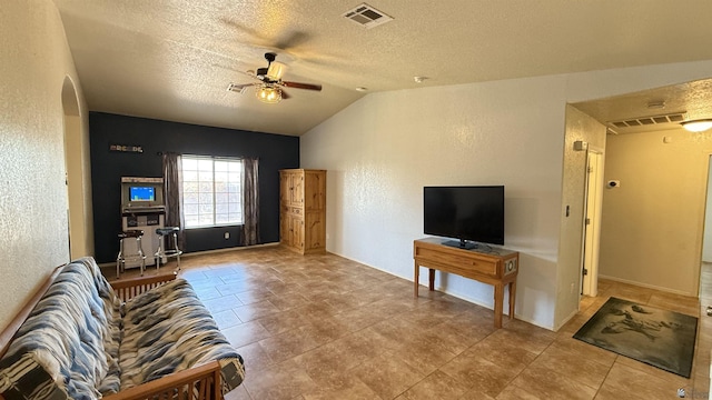 6311 E 42nd St, Yuma, AZ 85365 - living area featuring a ceiling fan, a textured ceiling, vaulted ceiling, and a textured wall