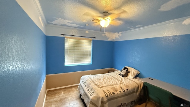 6311 E 42nd St, Yuma, AZ 85365 - tiled bedroom featuring crown molding, a textured ceiling, ceiling fan, and a textured wall