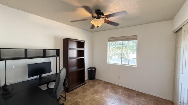 6311 E 42nd St, Yuma, AZ 85365 - tiled home office featuring a ceiling fan and baseboards