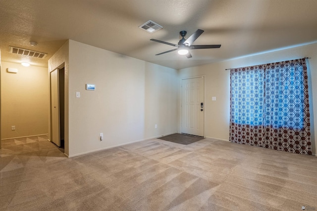 7959 E 43rd Pl, Yuma, AZ 85365 - empty room with carpet, a ceiling fan, and visible vents