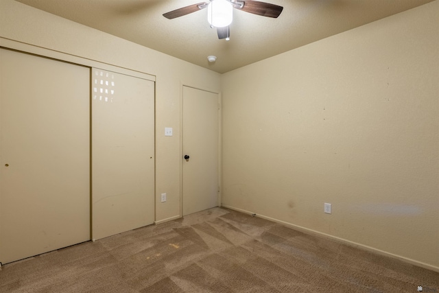 7959 E 43rd Pl, Yuma, AZ 85365 - unfurnished bedroom with carpet floors, ceiling fan, and a closet