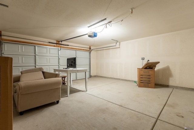 7959 E 43rd Pl, Yuma, AZ 85365 - garage with baseboards and a garage door opener
