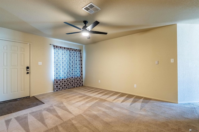 7959 E 43rd Pl, Yuma, AZ 85365 - entrance foyer with carpet floors, a ceiling fan, baseboards, and visible vents