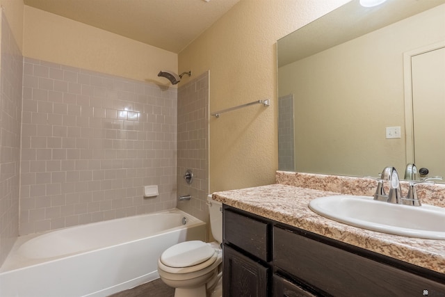 7959 E 43rd Pl, Yuma, AZ 85365 - bathroom with toilet, a textured wall, washtub / shower combination, and vanity