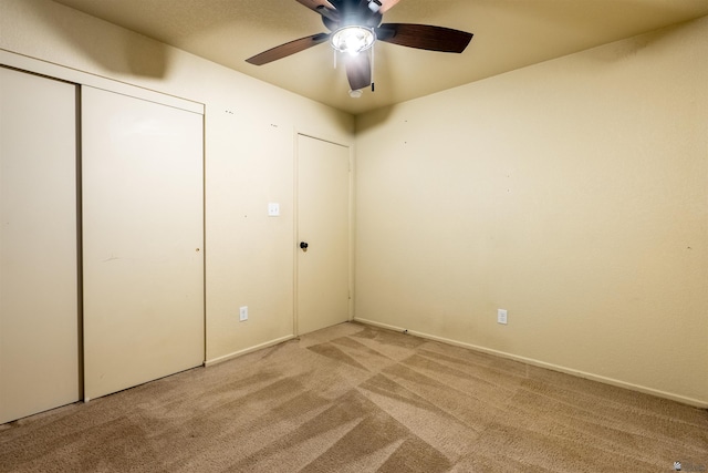 7959 E 43rd Pl, Yuma, AZ 85365 - unfurnished bedroom featuring ceiling fan, a closet, and light colored carpet