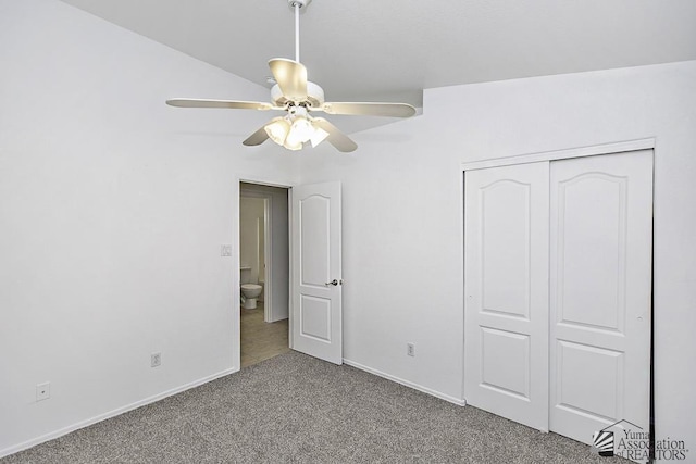 unfurnished bedroom featuring carpet floors, baseboards, a ceiling fan, and a closet