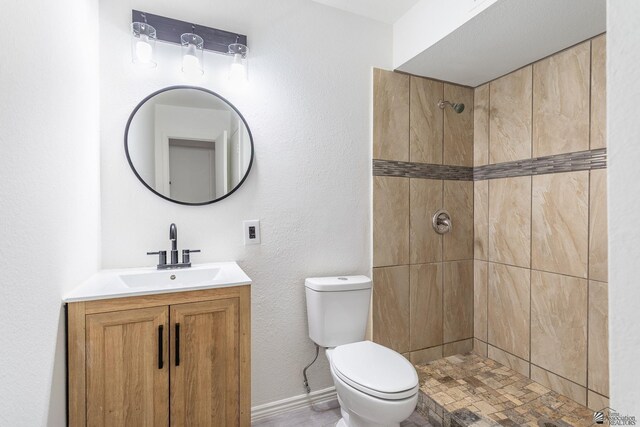 541 E Hacienda Dr, Yuma, AZ 85365 - bathroom with vanity, tiled shower, and toilet