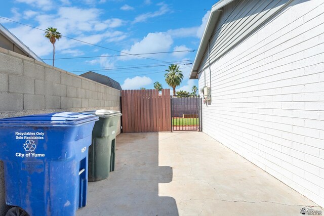 541 E Hacienda Dr, Yuma, AZ 85365 - view of patio featuring a gate