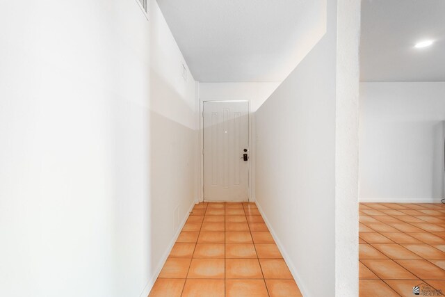 541 E Hacienda Dr, Yuma, AZ 85365 - hallway with light tile patterned floors