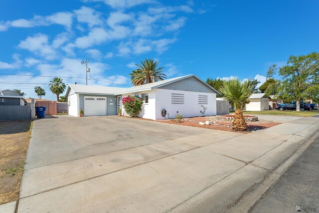 541 E Hacienda Dr, Yuma, AZ 85365 - view of front of property featuring driveway and an attached garage