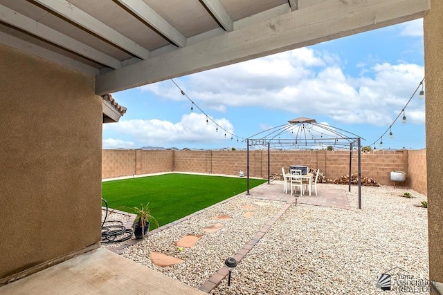 4272 W 27th Pl, Yuma, AZ 85364 - view of yard with a fenced backyard, a patio, and a gazebo