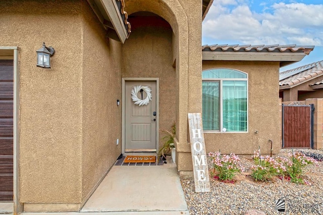 4272 W 27th Pl, Yuma, AZ 85364 - property entrance featuring a tile roof and stucco siding