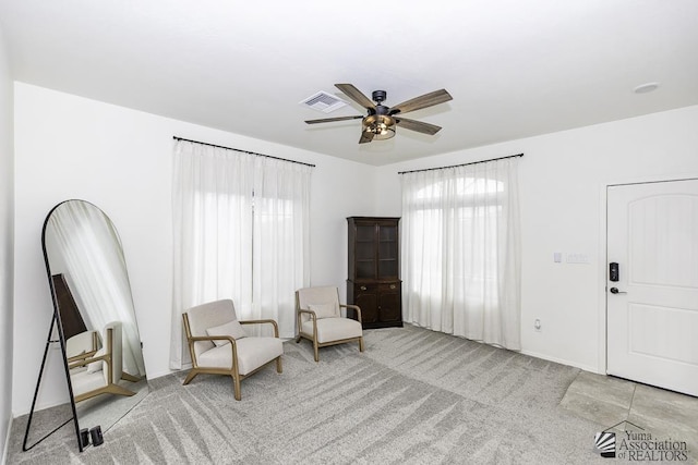 4272 W 27th Pl, Yuma, AZ 85364 - sitting room featuring carpet floors, plenty of natural light, a ceiling fan, and visible vents