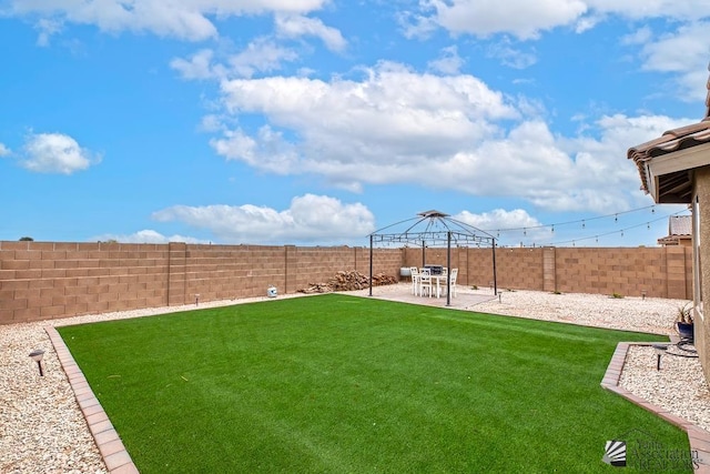 4272 W 27th Pl, Yuma, AZ 85364 - view of yard featuring a fenced backyard, a gazebo, and a patio area