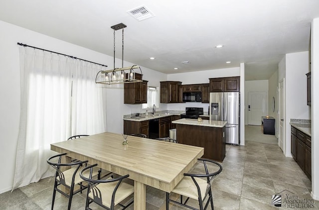 4272 W 27th Pl, Yuma, AZ 85364 - dining space with recessed lighting, visible vents, and a chandelier
