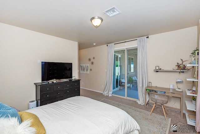 6588 E 35th Pl, Yuma, AZ 85365 - carpeted bedroom with access to outside and baseboards