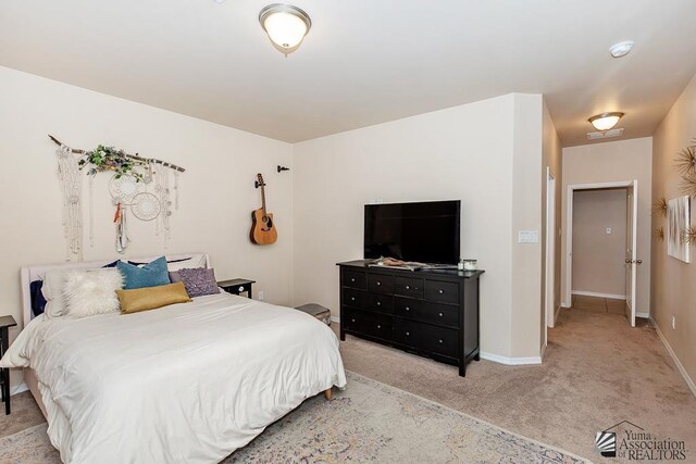 6588 E 35th Pl, Yuma, AZ 85365 - carpeted bedroom featuring baseboards