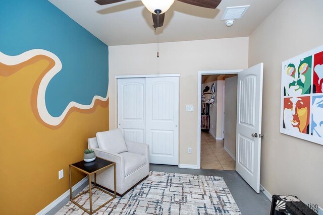 6588 E 35th Pl, Yuma, AZ 85365 - living area with a ceiling fan and concrete floors