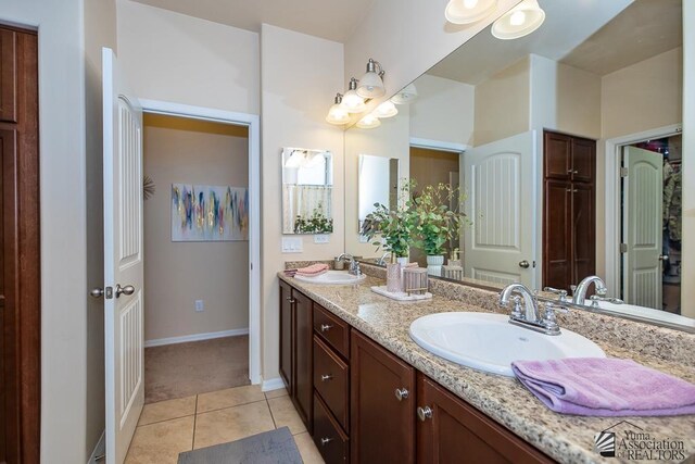 6588 E 35th Pl, Yuma, AZ 85365 - bathroom featuring double vanity and tile patterned flooring