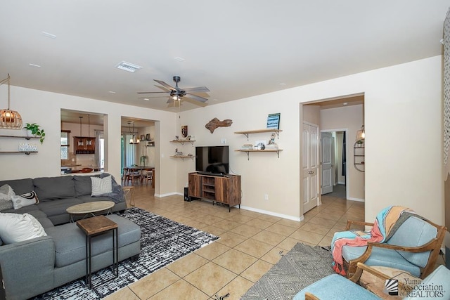 6588 E 35th Pl, Yuma, AZ 85365 - living area with light tile patterned floors and ceiling fan