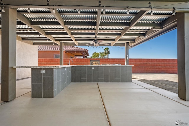 view of patio / terrace featuring a ceiling fan