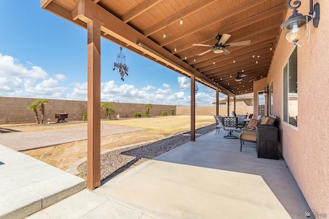 view of patio / terrace featuring a fenced backyard and a ceiling fan