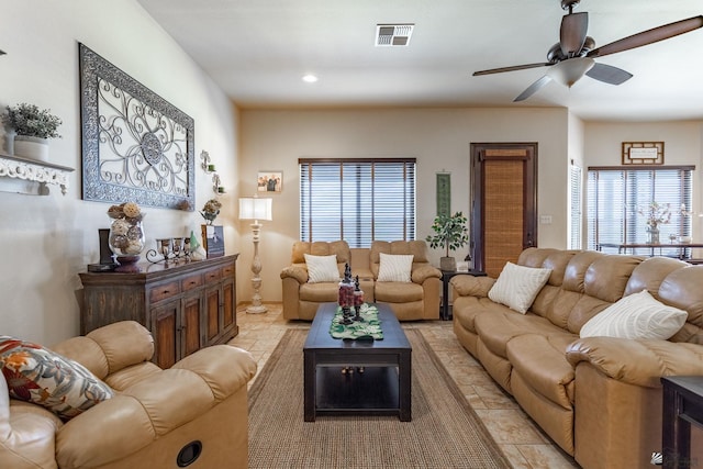 living room with recessed lighting, visible vents, and a ceiling fan