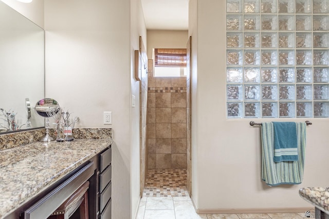 full bath with wine cooler, a walk in shower, and vanity