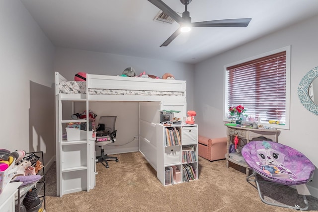 carpeted bedroom featuring ceiling fan