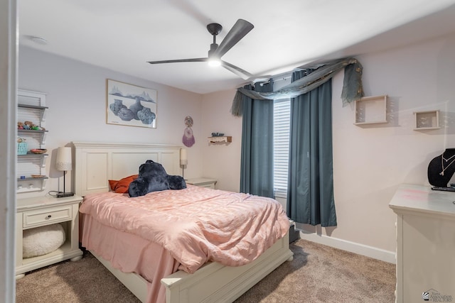 bedroom featuring ceiling fan and light carpet