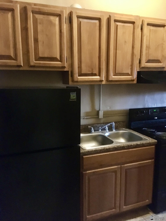 621 S Madison Ave, Yuma, AZ 85364 - kitchen featuring freestanding refrigerator, range, ventilation hood, a sink, and dark countertops