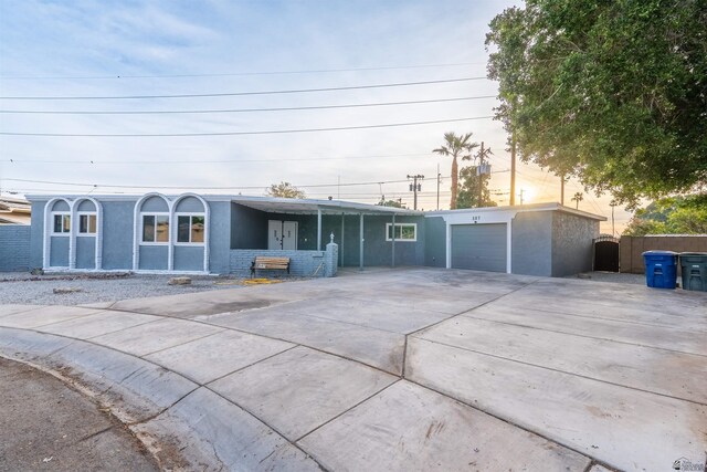 187 S San Clemente Dr, Yuma, AZ 85364 - ranch-style house featuring a garage, concrete driveway, and stucco siding
