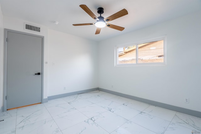 187 S San Clemente Dr, Yuma, AZ 85364 - unfurnished room featuring light marble finish flooring, baseboards, a ceiling fan, and a smoke detector