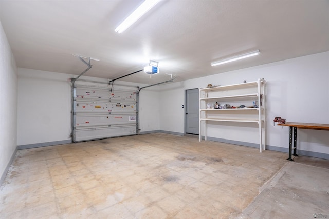 187 S San Clemente Dr, Yuma, AZ 85364 - garage with a garage door opener and baseboards