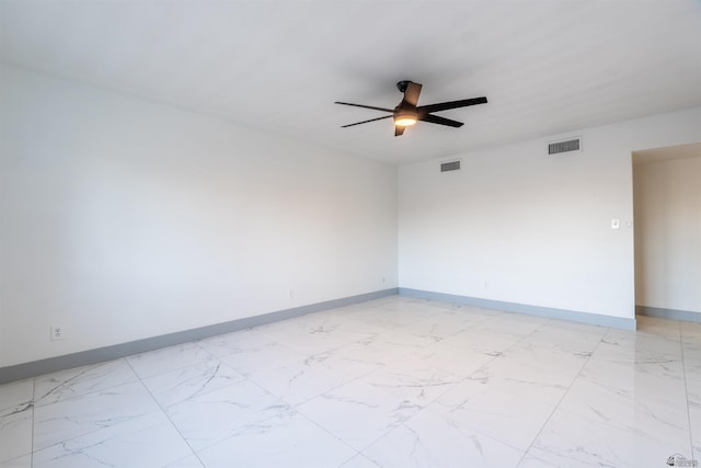 187 S San Clemente Dr, Yuma, AZ 85364 - unfurnished room featuring light marble finish floors, baseboards, and ceiling fan