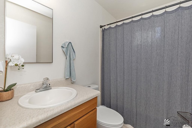 7442 E 24th Ln, Yuma, AZ 85365 - bathroom featuring toilet and vanity