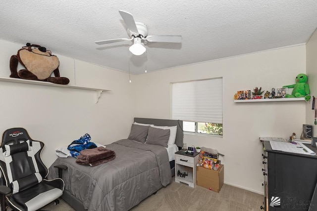 7442 E 24th Ln, Yuma, AZ 85365 - bedroom featuring light carpet, a textured ceiling, and ceiling fan